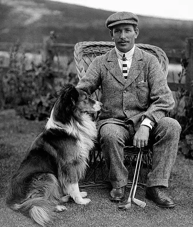 old golf photo with his dog 